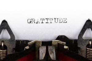 Typewriter with text gratitude